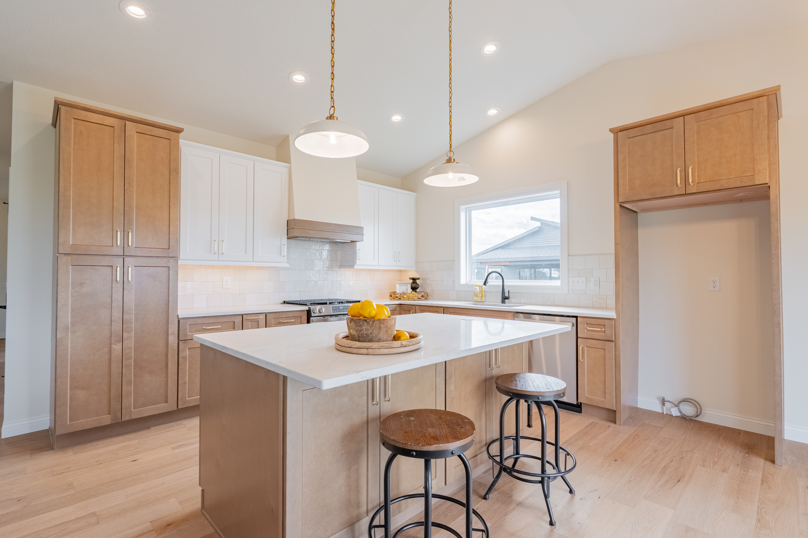 2538 Marble Road Normal, IL 61761 - Photo 13 of 52 a kitchen with a sink a stove a refrigerator and white cabinets with wooden floor
