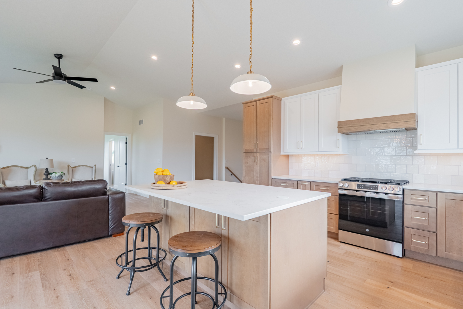 2538 Marble Road Normal, IL 61761 - Photo 18 of 52 a large kitchen with stainless steel appliances a stove a sink a dining table and chairs