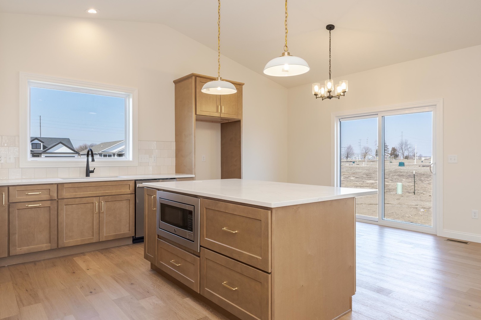 2538 Marble Road Normal, IL 61761 - Photo 21 of 52 a kitchen with kitchen island a sink stainless steel appliances and cabinets