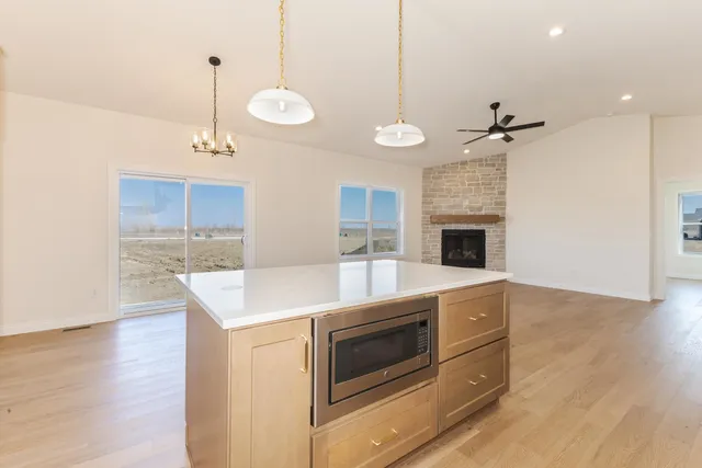 a white stove top oven sitting inside of a kitchen