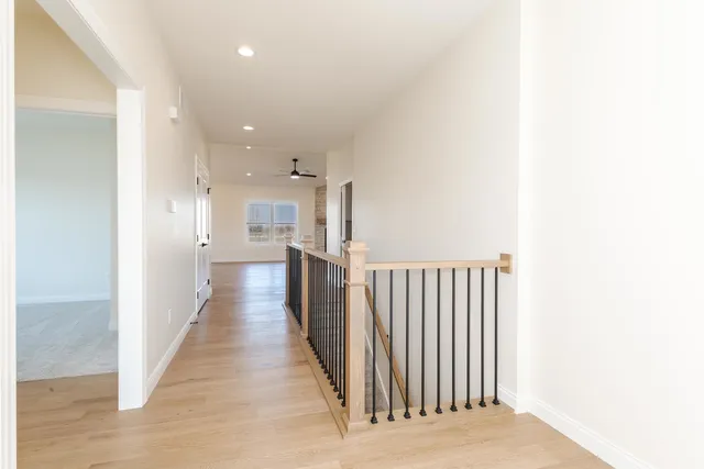 a view of empty room with wooden walls