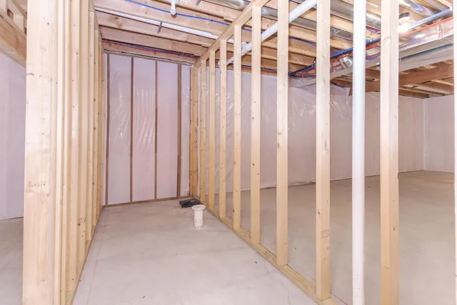 a aerial view of a house next to a big yard