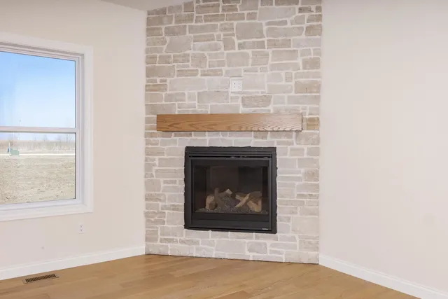 a white building with a fireplace