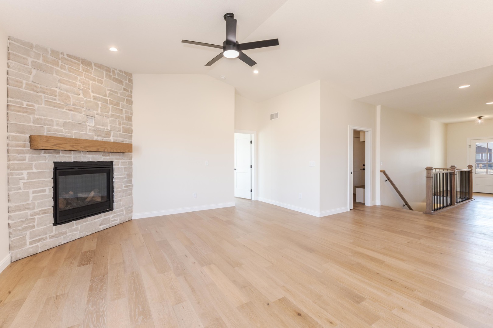 2538 Marble Road Normal, IL 61761 - Photo 7 of 52 a view of empty room with wooden floor and fireplace