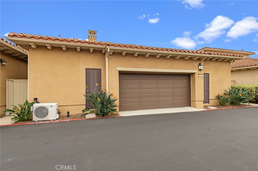 77 Hallmark Irvine, CA 92620 - Photo 35 of 35 a view of a house with a garage