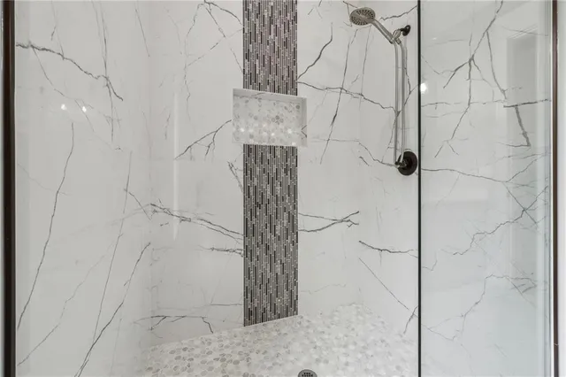 a bathroom with a double vanity sink and a bathtub