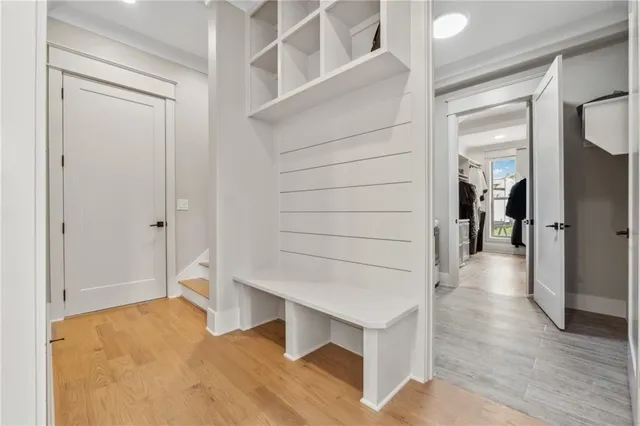 an aerial view of residential house with an outdoor space and seating