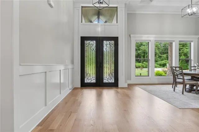 a view of a livingroom with furniture and a table