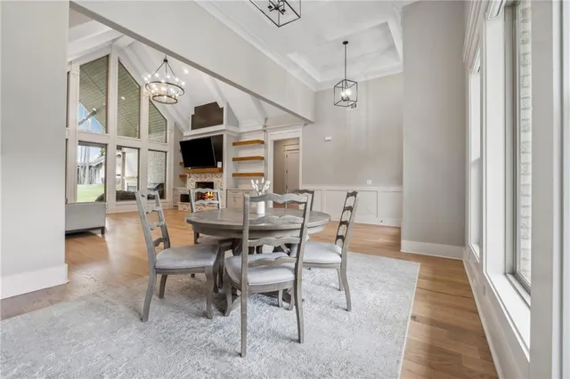 a view of a livingroom with furniture window and wooden floor