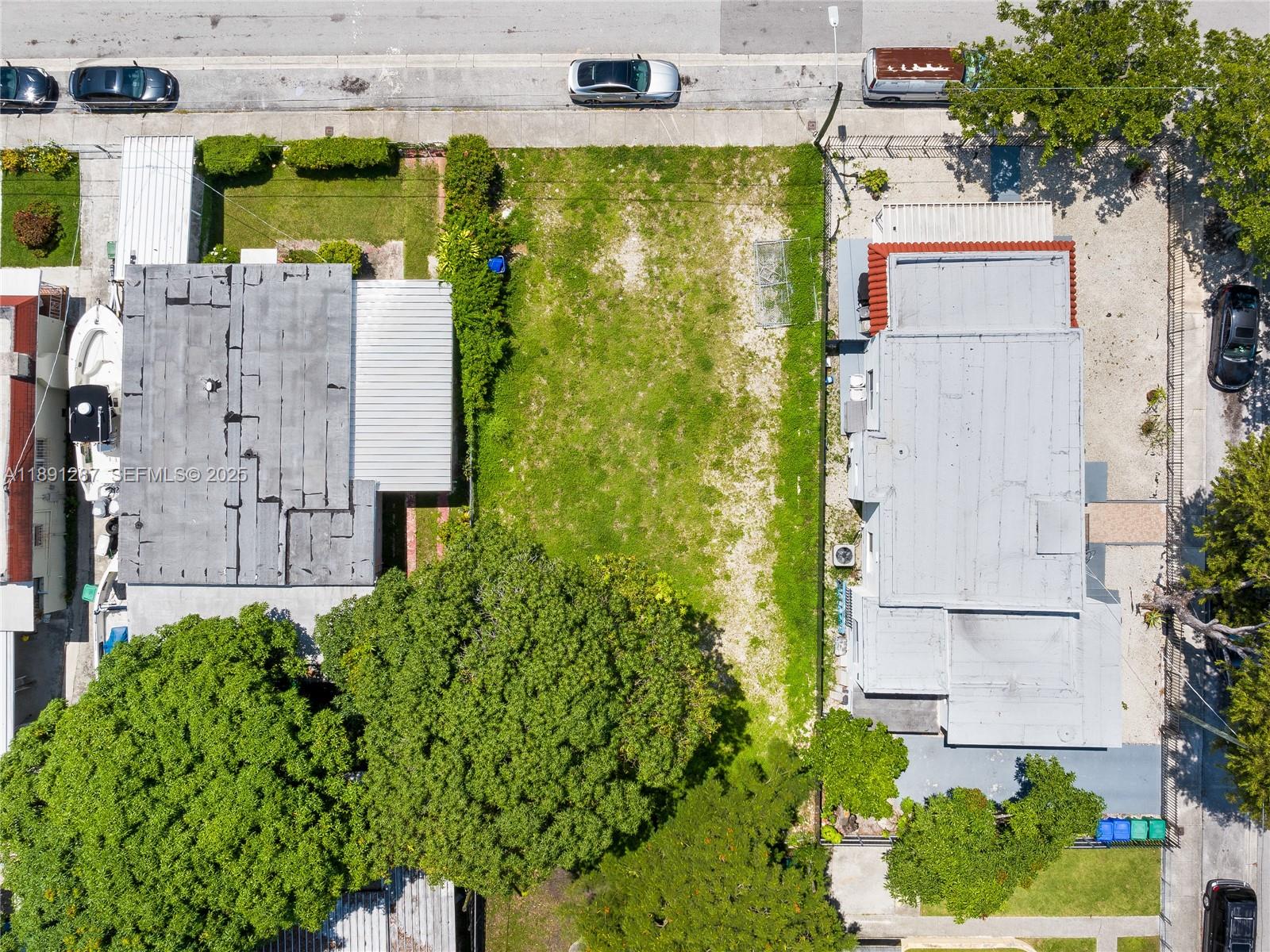 1881 Northwest 4th Street Miami, FL 33125 - Photo 8 of 8 aerial view of multiple house with a garden