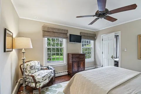 a bathroom with a sink vanity and a mirror