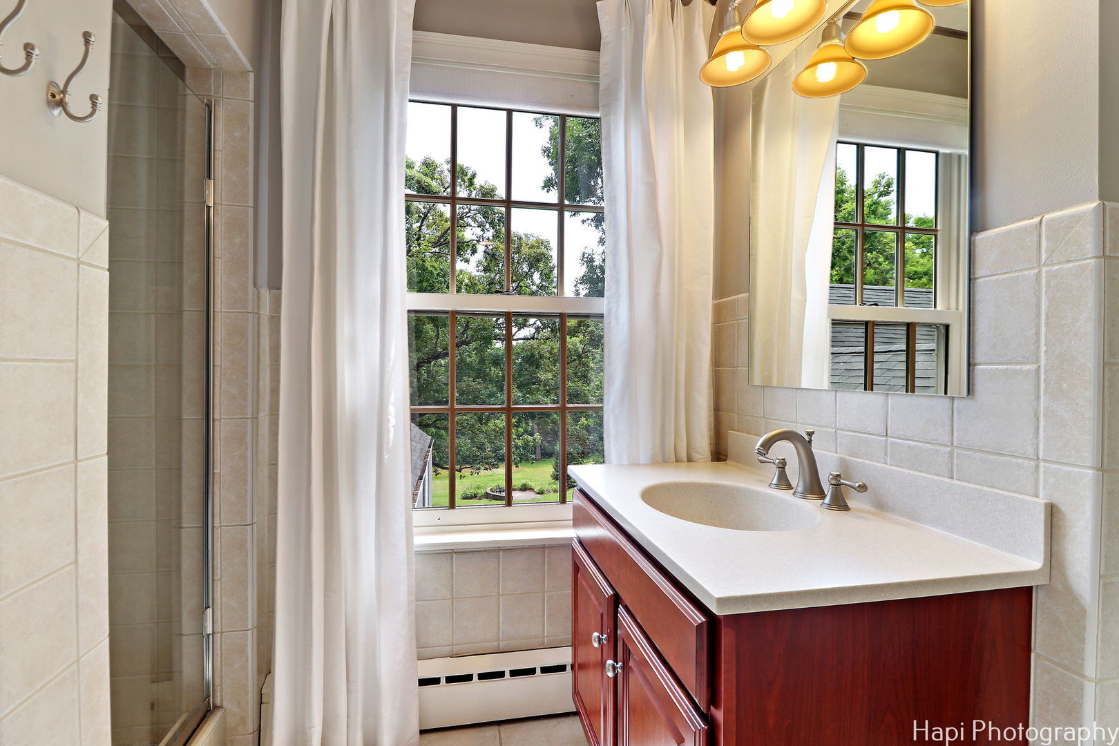 35W543 Miller Road Dundee, IL 60110 - Photo 26 of 68 a bathroom with a sink and a mirror