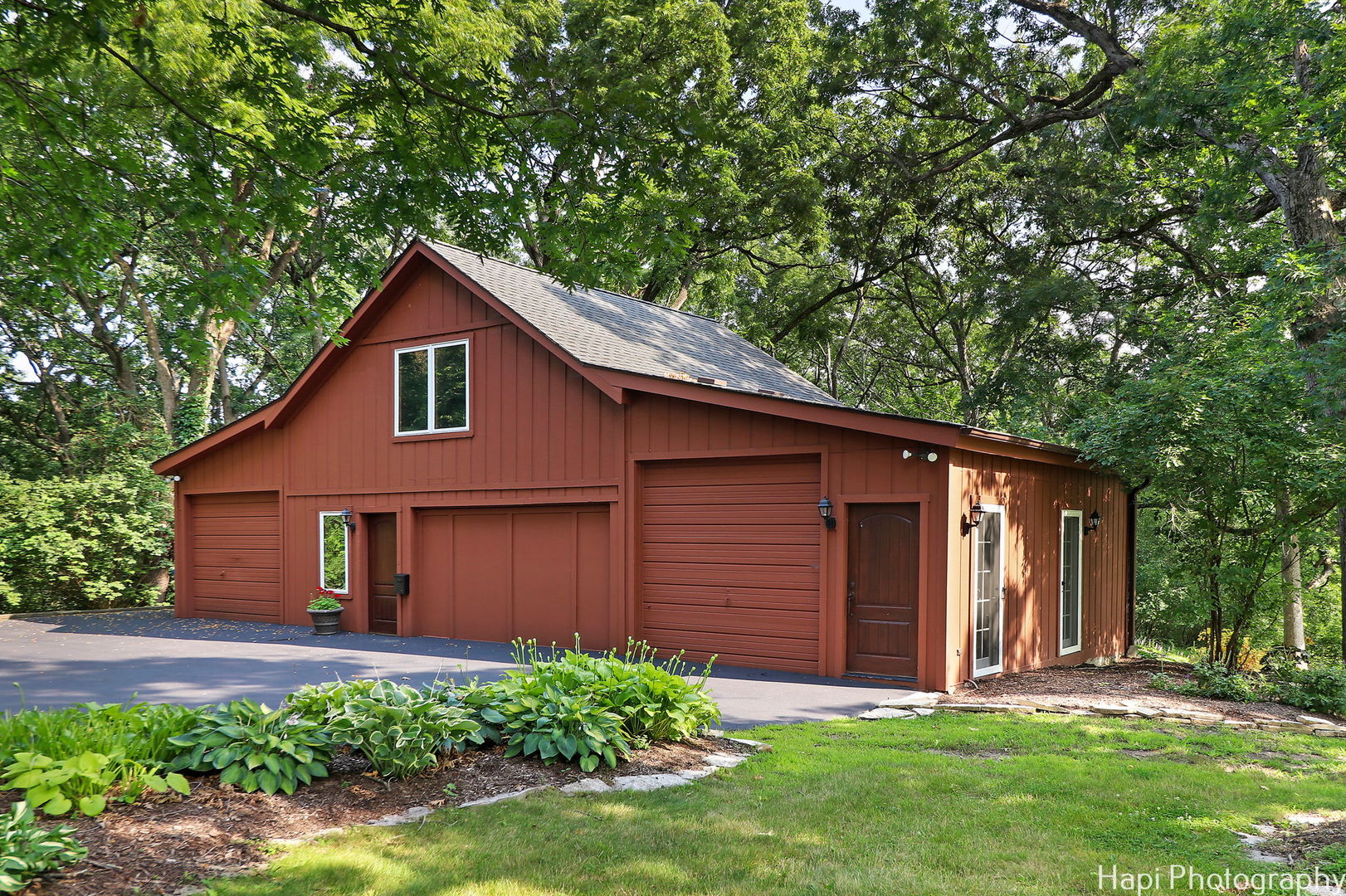 35W543 Miller Road Dundee, IL 60110 - Photo 54 of 68 a front view of a house with a garden and yard