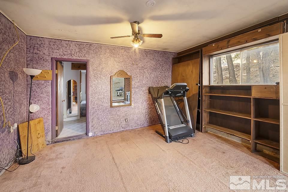 8780 Paloma Way Reno, NV 89506 - Photo 16 of 22 a view of a room with gym equipment