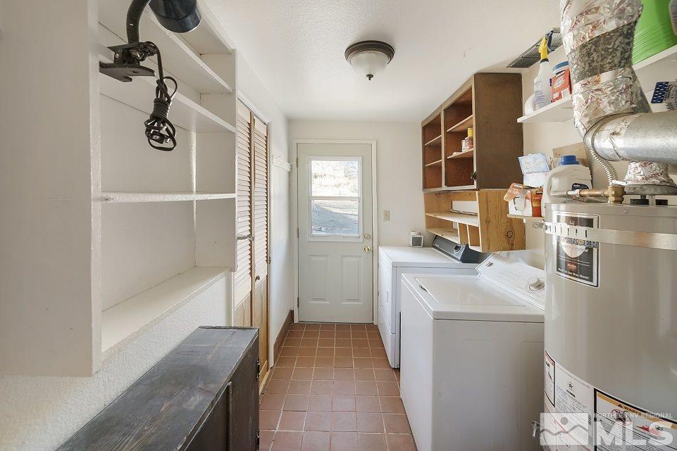 8780 Paloma Way Reno, NV 89506 - Photo 17 of 22 a kitchen with a refrigerator a stove and a sink