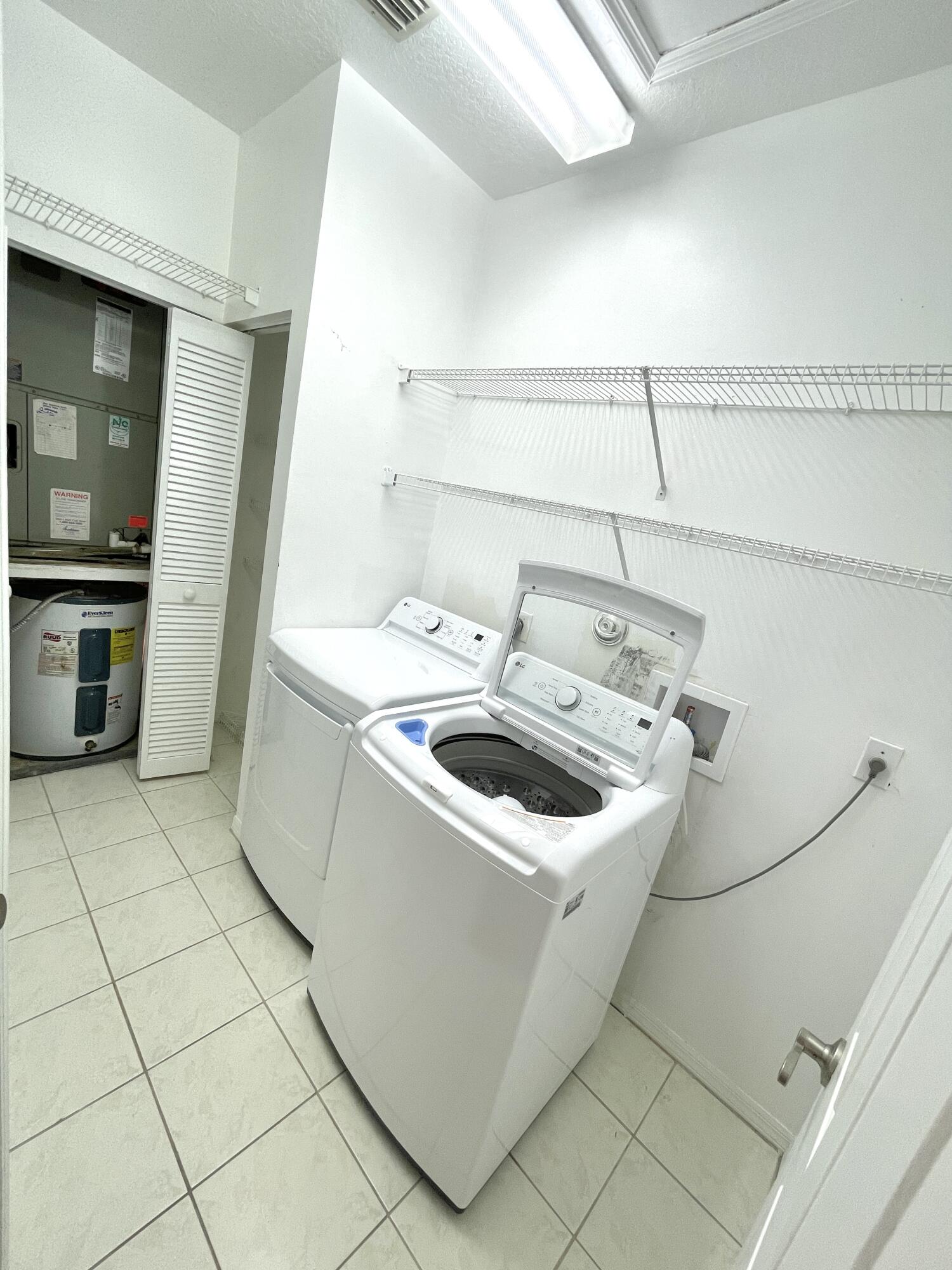 8550 Vía Romana, Unit 2 Boca Raton, FL 33496 - Photo 25 of 28 a utility room with washer and dryer