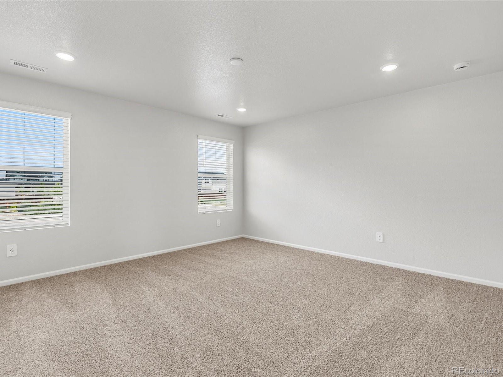 7300 West 27th St Road Greeley, CO 80634 - Photo 17 of 39 an empty room with windows