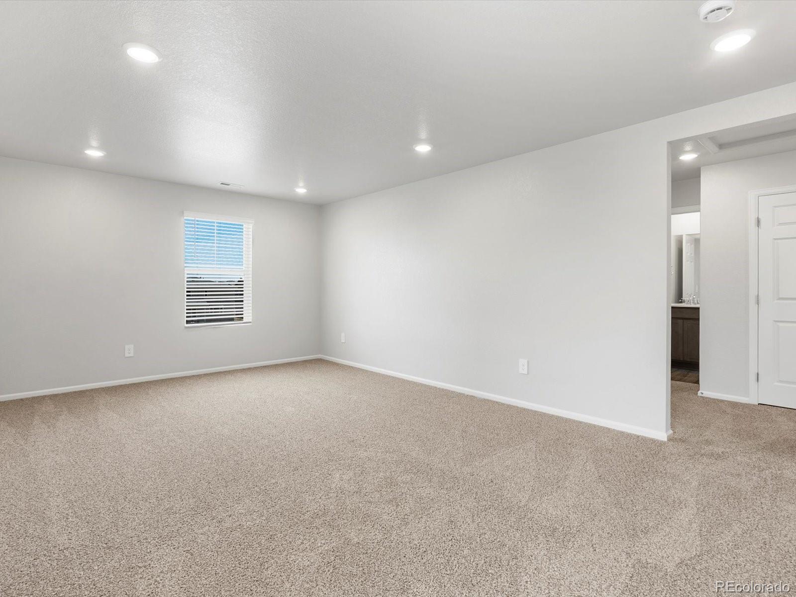 7300 West 27th St Road Greeley, CO 80634 - Photo 26 of 39 an empty room with a empty space and windows