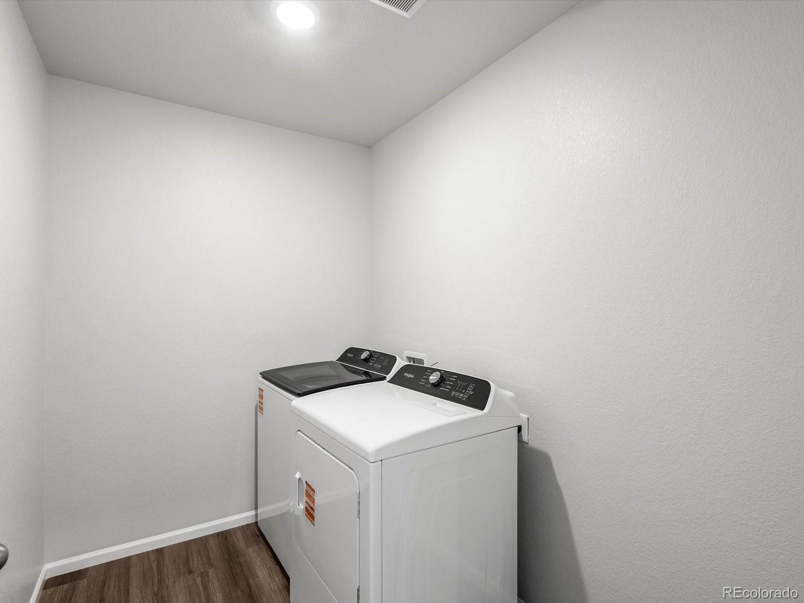 7300 West 27th St Road Greeley, CO 80634 - Photo 29 of 39 a utility room with dryer and washer