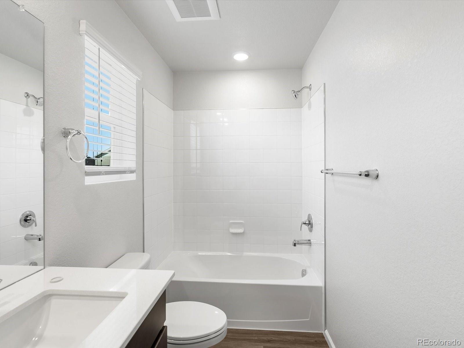 7300 West 27th St Road Greeley, CO 80634 - Photo 36 of 39 a bathroom with a sink a toilet and shower