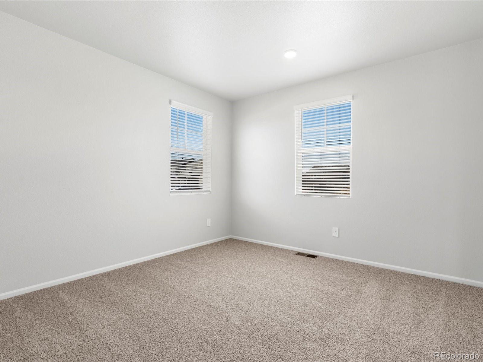 7300 West 27th St Road Greeley, CO 80634 - Photo 4 of 39 an empty room with a window