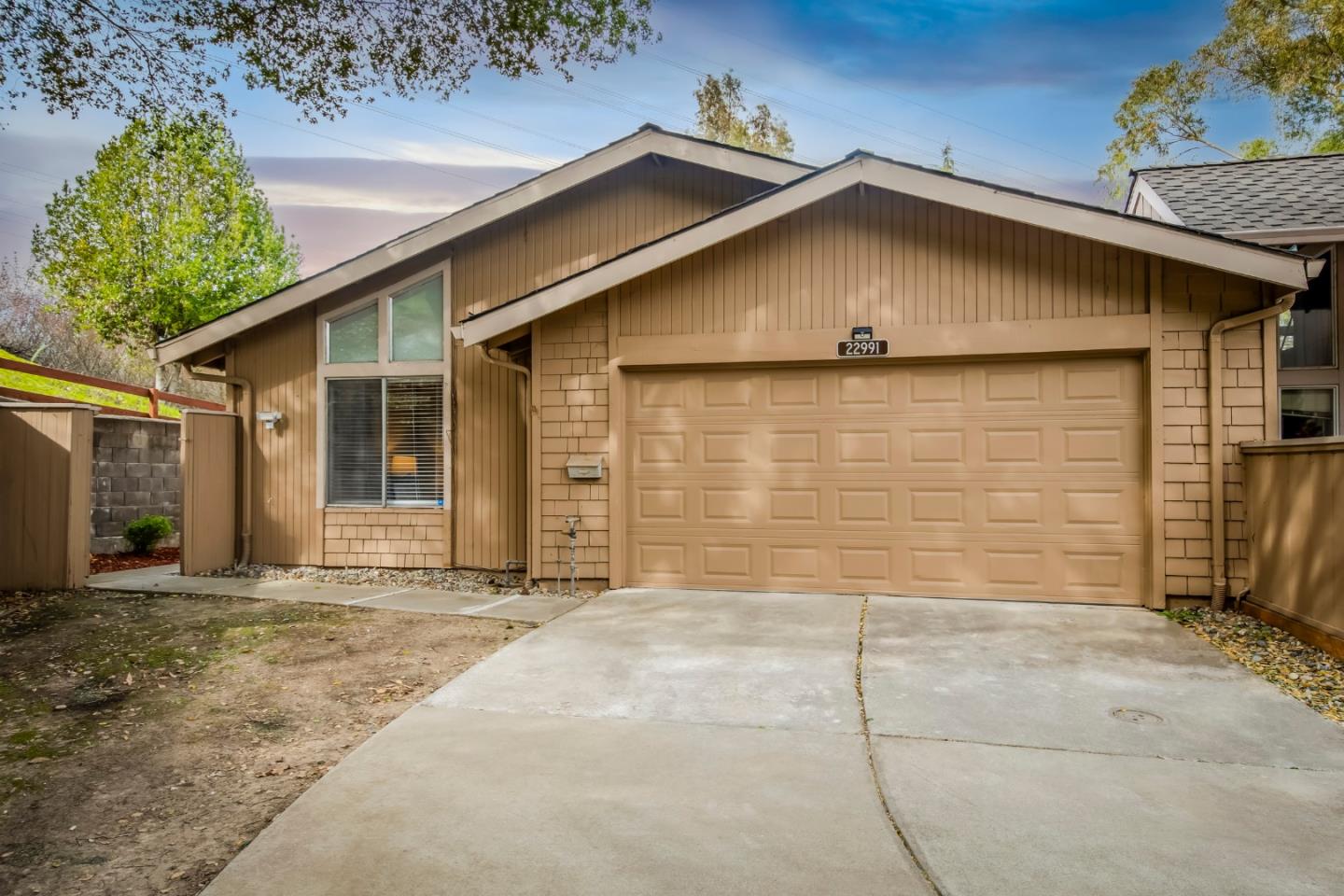 22991 Longdown Road Cupertino, CA 95014 - Photo 2 of 31 a house with a outdoor space