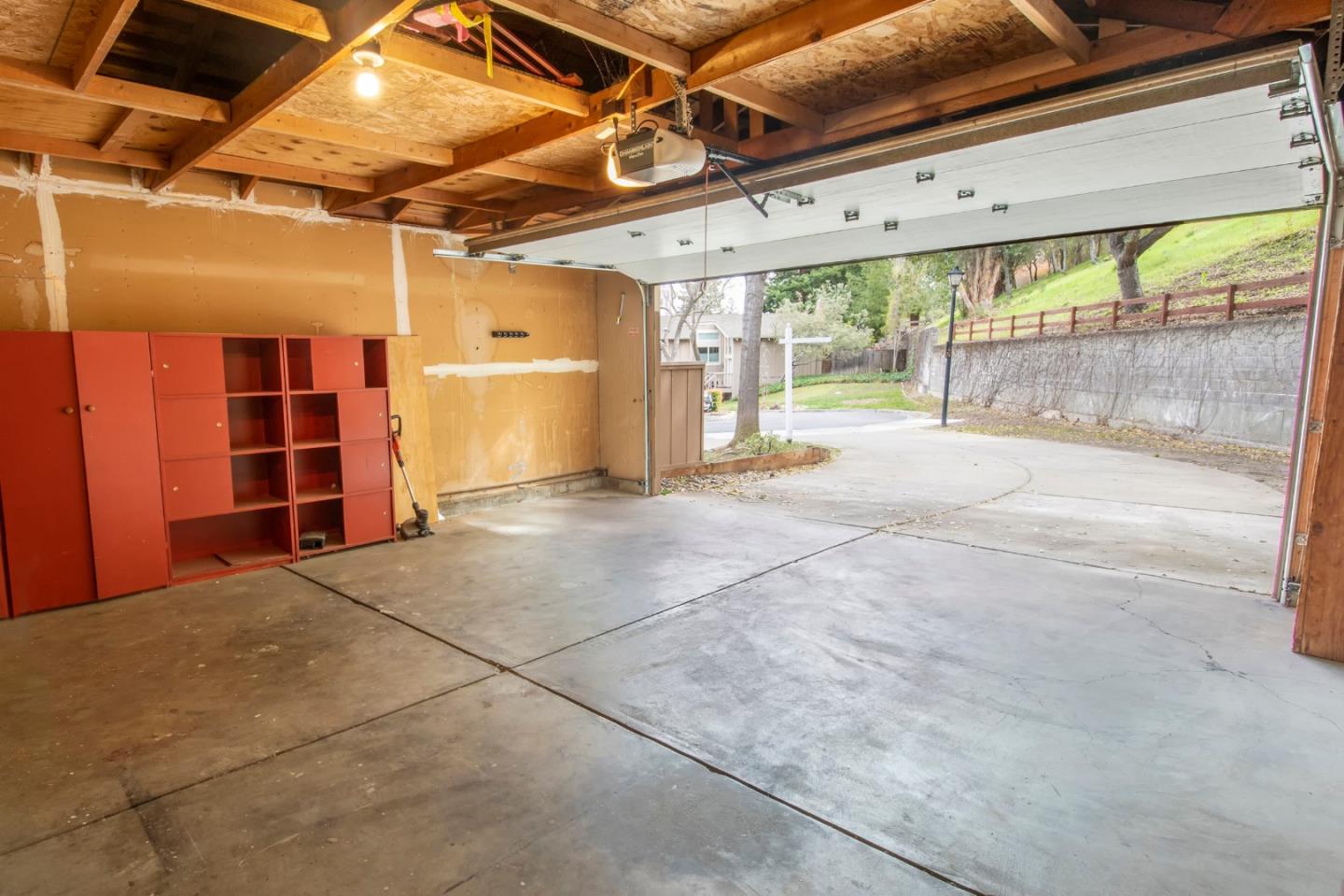 22991 Longdown Road Cupertino, CA 95014 - Photo 25 of 31 a view of an empty room with a balcony