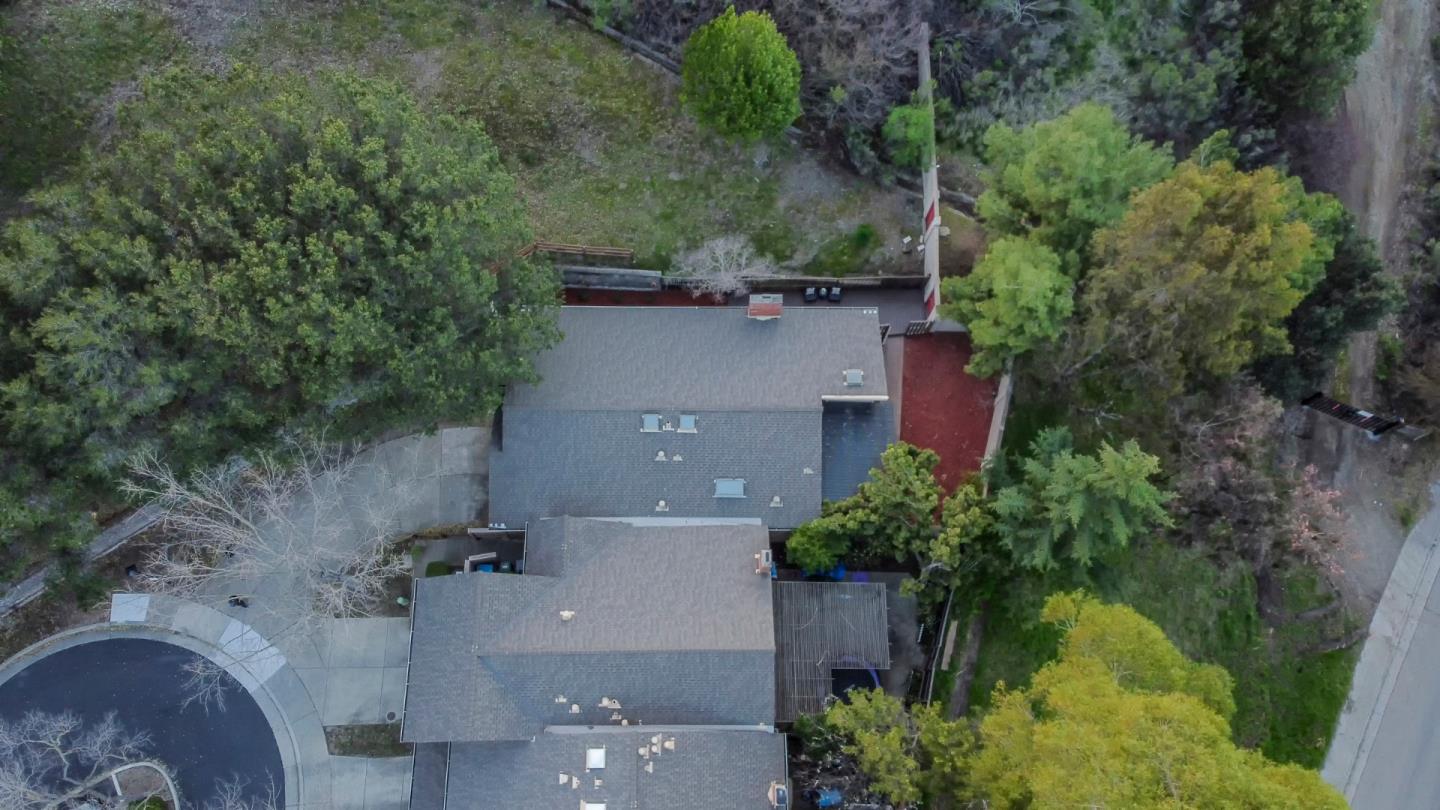 22991 Longdown Road Cupertino, CA 95014 - Photo 5 of 31 an aerial view of a house with a yard and garden