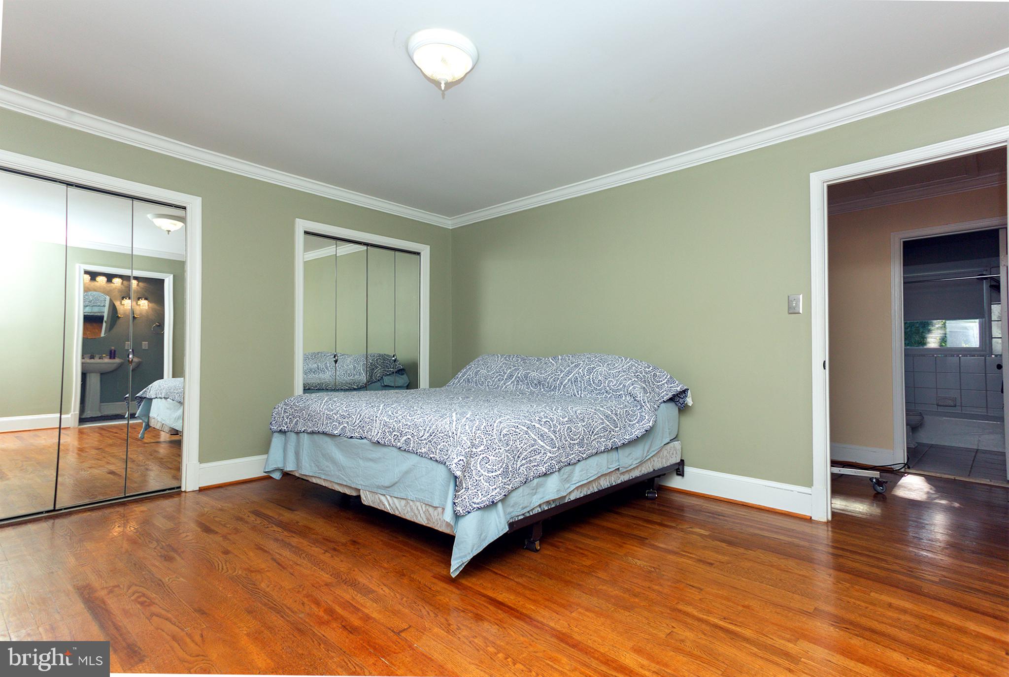 14705 Notley Road Silver Spring, MD 20905 - Photo 12 of 28 Spacious bedroom with mirrored closets.