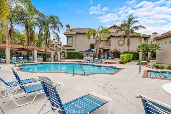 a view of a house with a swimming pool