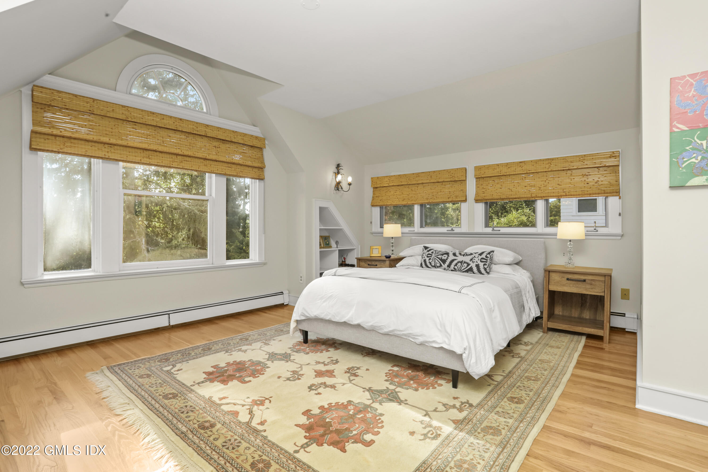 12 Maher Avenue Greenwich, CT 06830 - Photo 12 of 34 a bedroom with a bed and a window