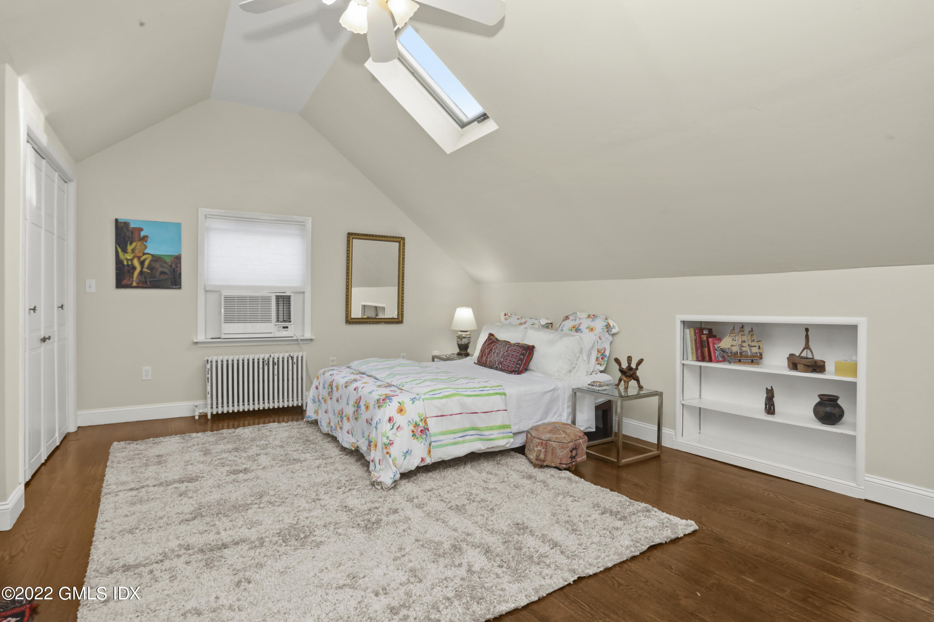 12 Maher Avenue Greenwich, CT 06830 - Photo 20 of 34 a bedroom with a bed and closet