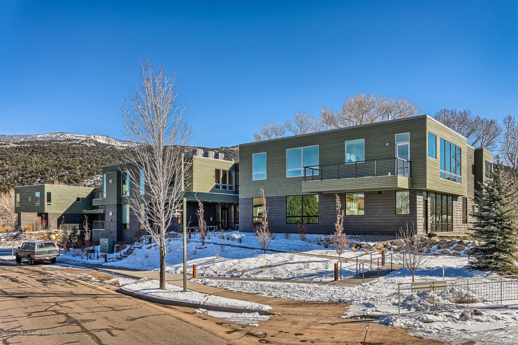 104 Evans Road, Unit 202 Basalt, CO 81621 - Photo 16 of 23 a front view of a house with a yard