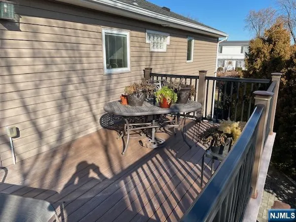 a view of balcony with furniture