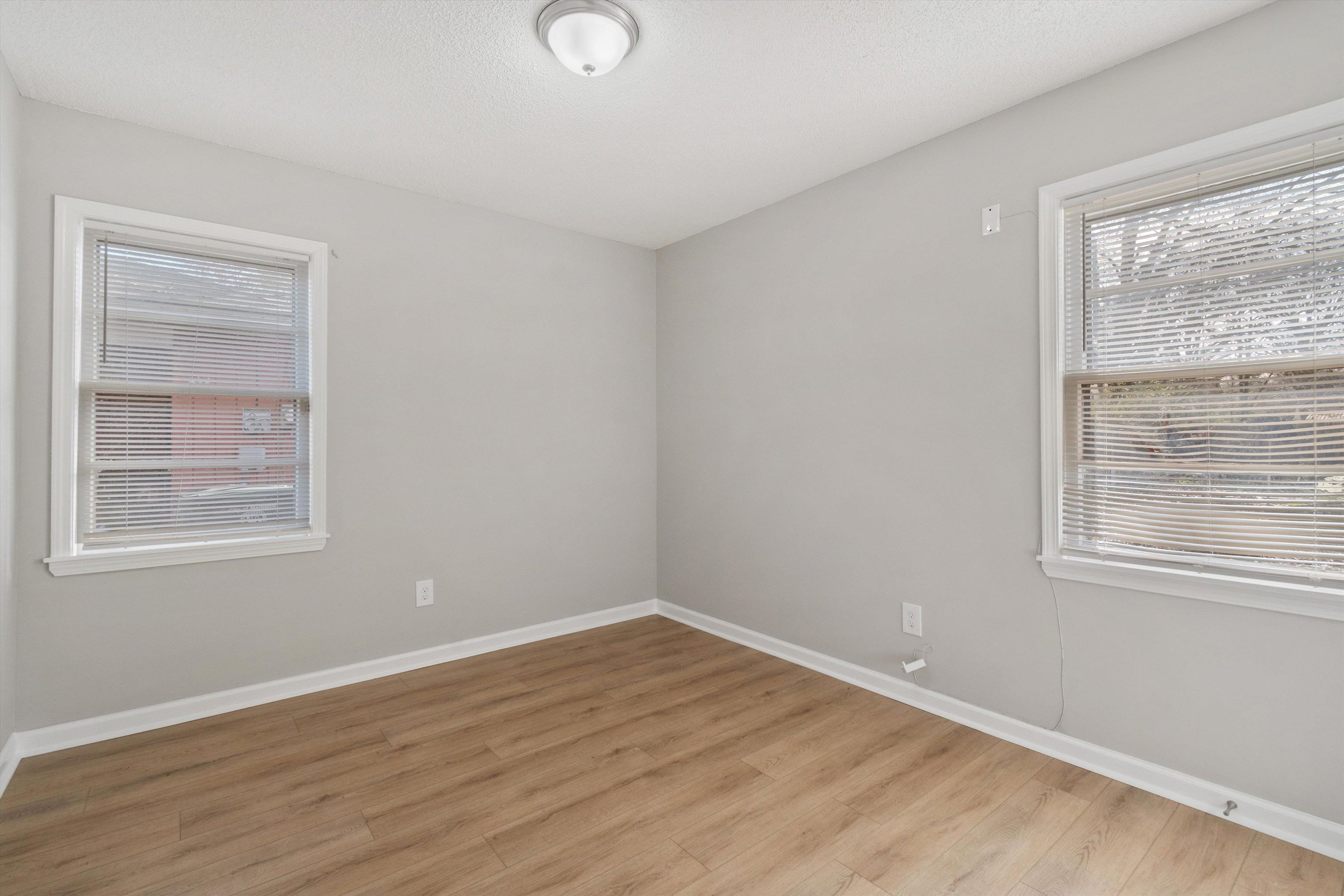 4487 East Dearing Road Memphis, TN 38117 - Photo 21 of 27 Spare room with light wood-style floors and baseboards