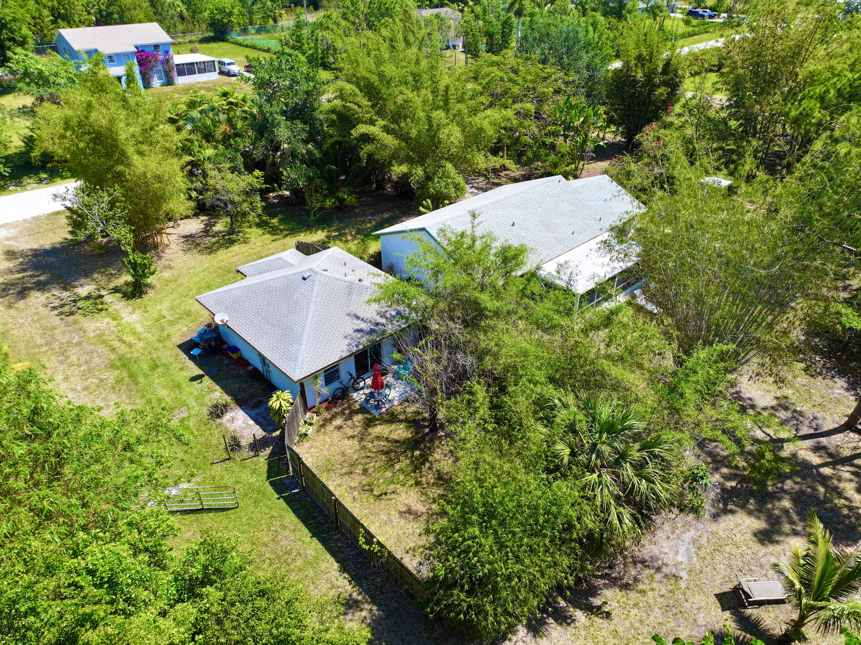 16930 93rd Road North Loxahatchee, FL 33470 - Photo 11 of 148 dji_fly_20240422_115414_0014_17137139843