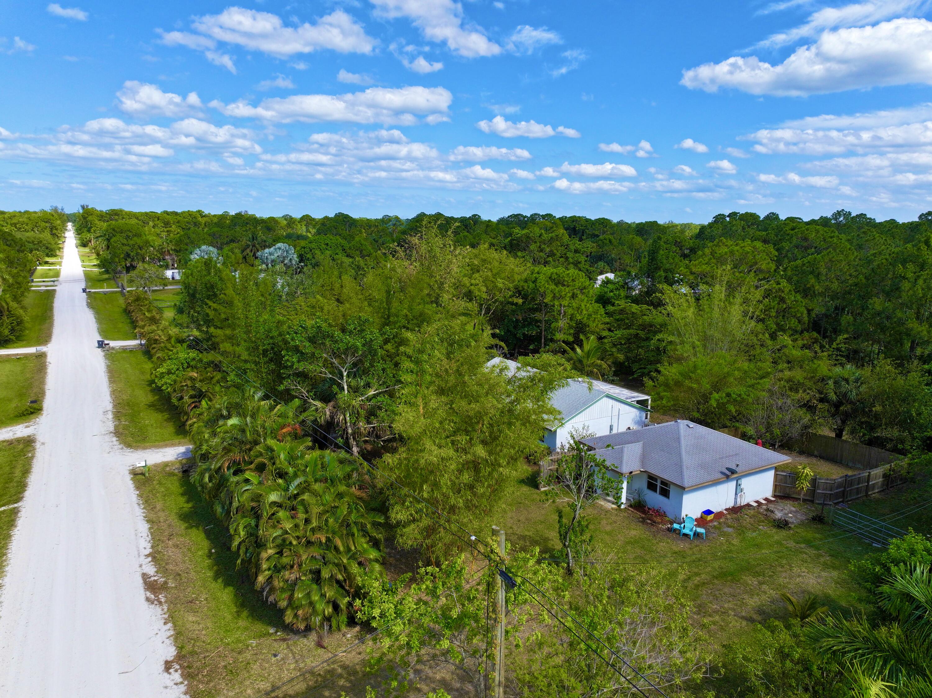 16930 93rd Road North Loxahatchee, FL 33470 - Photo 138 of 148 dji_fly_20240424_163544_0002_17139036857