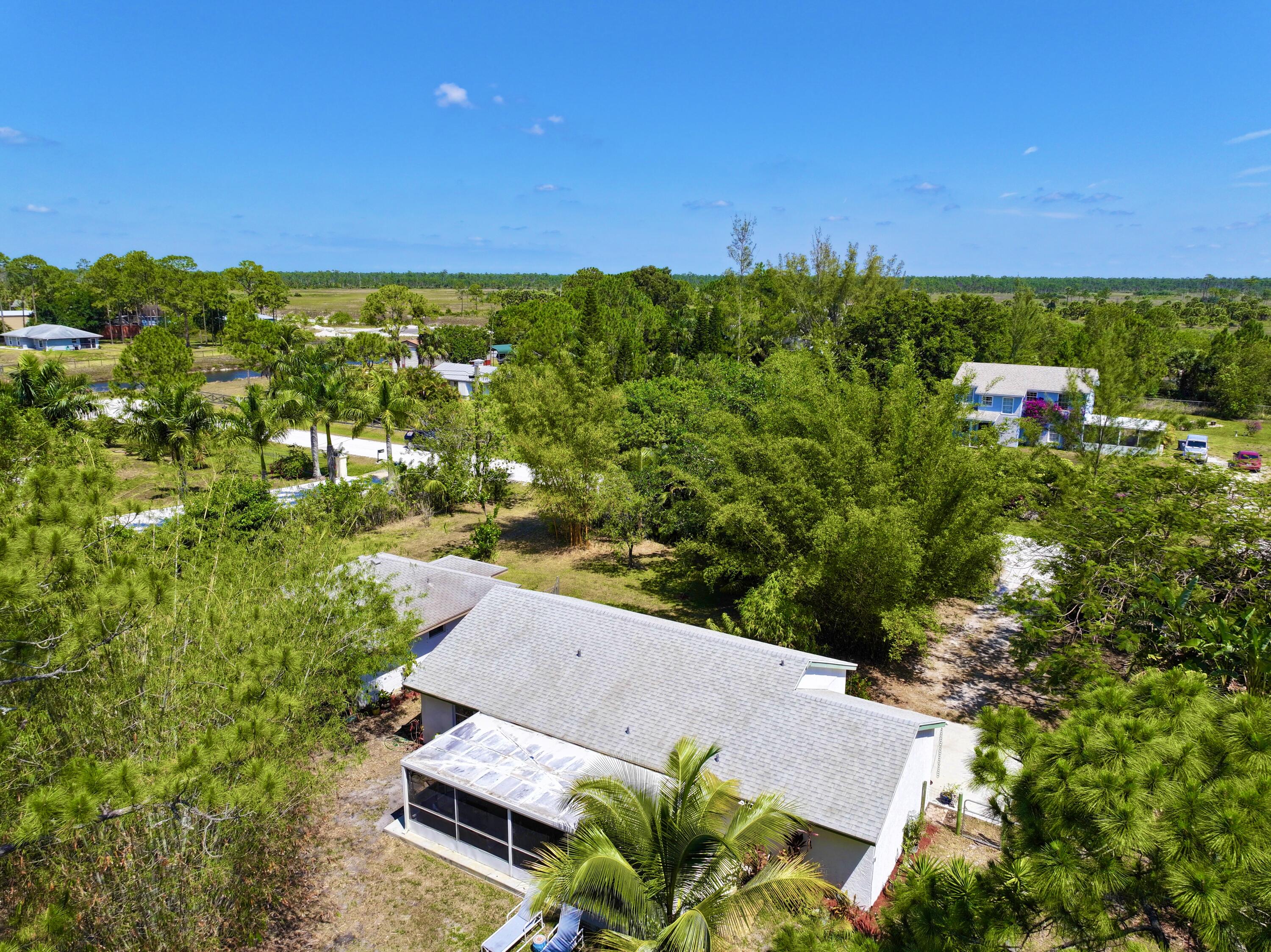 16930 93rd Road North Loxahatchee, FL 33470 - Photo 16 of 148 dji_fly_20240422_115458_0018_17137139829
