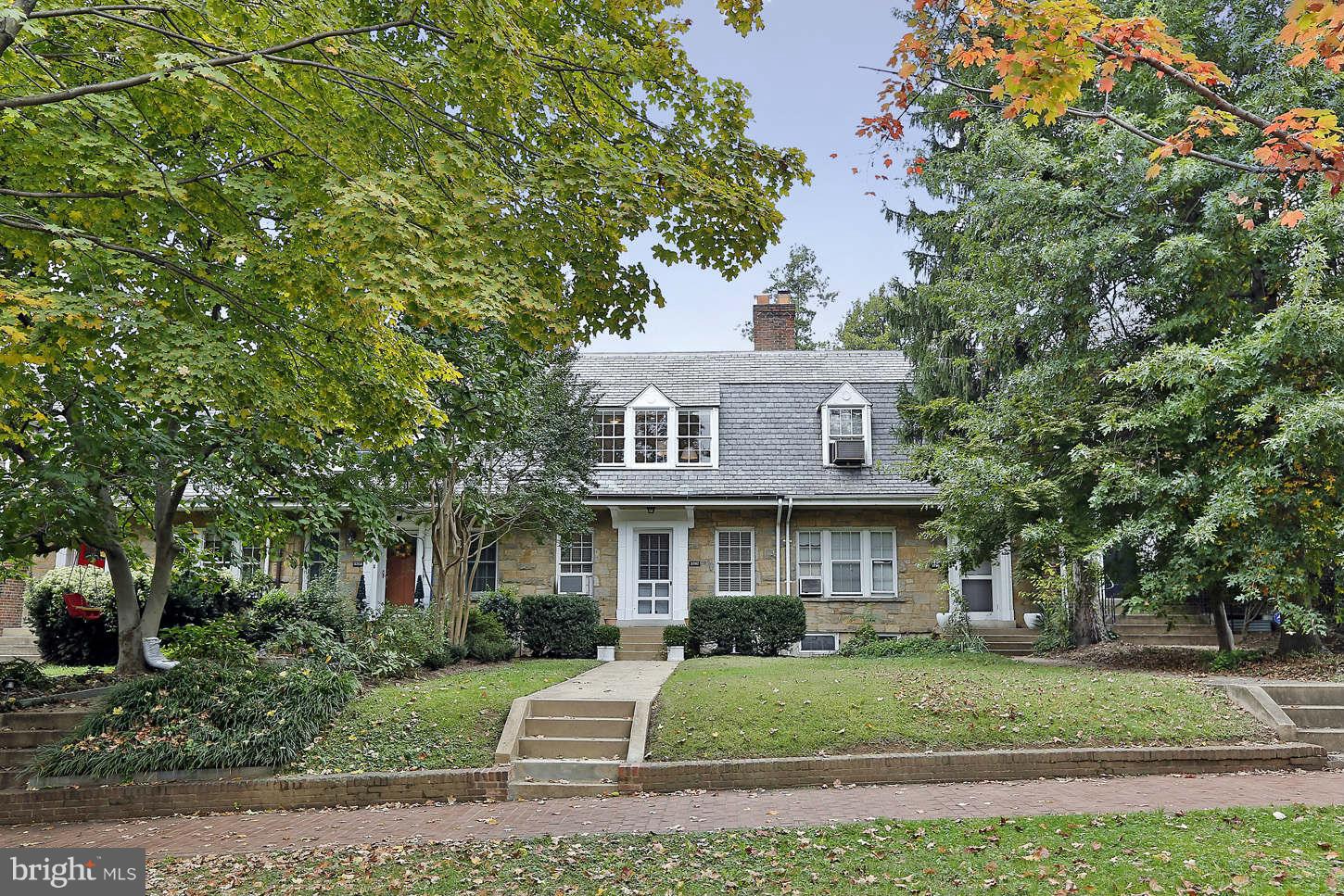 3707 Reservoir Road Northwest Washington, DC 20007 - Photo 2 of 19 a front view of a house with a yard