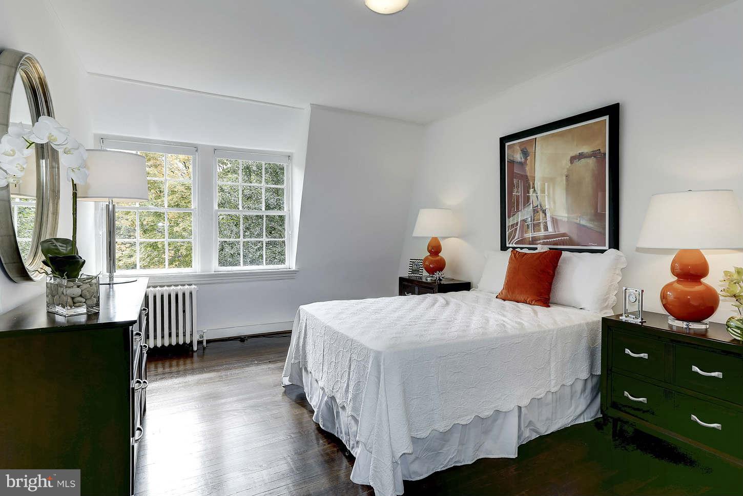 3707 Reservoir Road Northwest Washington, DC 20007 - Photo 14 of 19 a bedroom with a bed and a window