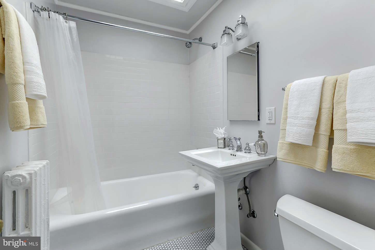 3707 Reservoir Road Northwest Washington, DC 20007 - Photo 15 of 19 a bathroom with a sink toilet and shower