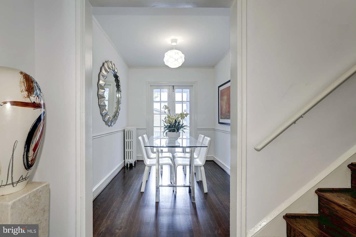 3707 Reservoir Road Northwest Washington, DC 20007 - Photo 6 of 19 a view of a house with wooden floor windows and entryway