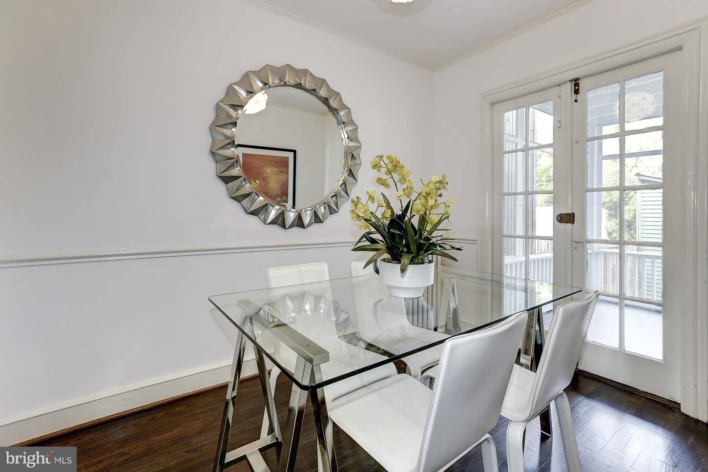 3707 Reservoir Road Northwest Washington, DC 20007 - Photo 7 of 19 a dining room with furniture and wooden floor
