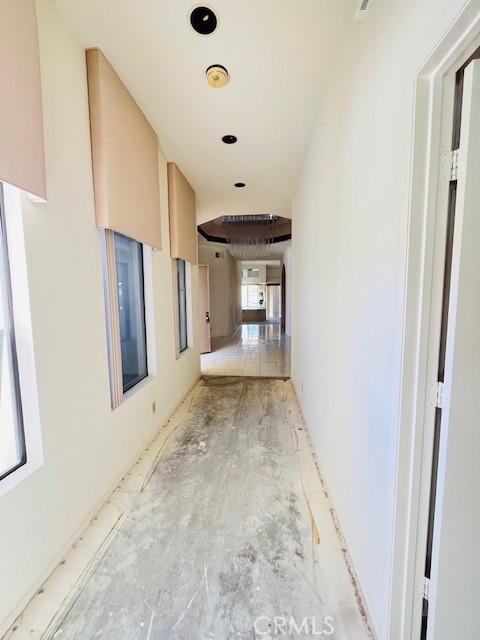 79990 Cedar Crest La Quinta, CA 92253 - Photo 11 of 19 a view of a hallway to a livingroom with a window