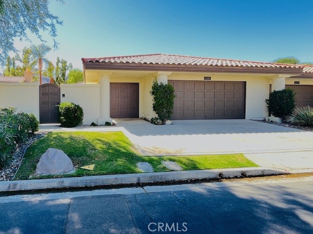 79990 Cedar Crest La Quinta, CA 92253 - Photo 2 of 19 a view of a house with a patio
