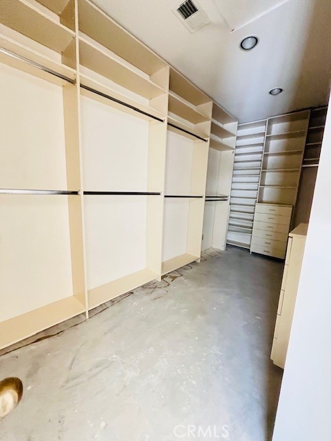 79990 Cedar Crest La Quinta, CA 92253 - Photo 10 of 19 a view of a room with a walk in closet and wooden floor