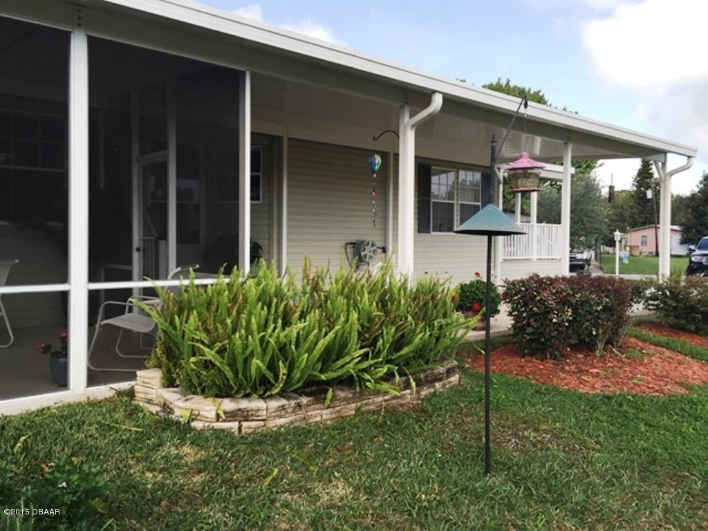 4357 Dolphin Way Edgewater, FL 32141 - Photo 13 of 25 large carport