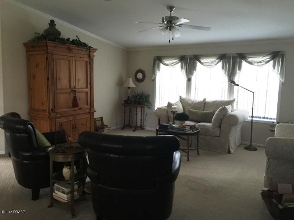 4357 Dolphin Way Edgewater, FL 32141 - Photo 14 of 25 Living room 3