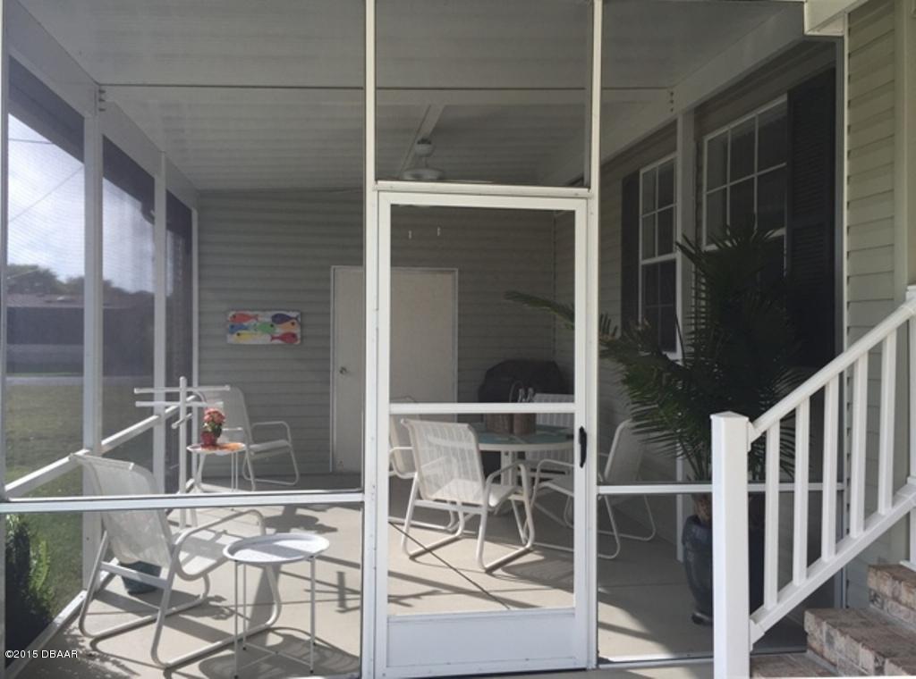 4357 Dolphin Way Edgewater, FL 32141 - Photo 19 of 25 Screened Porch