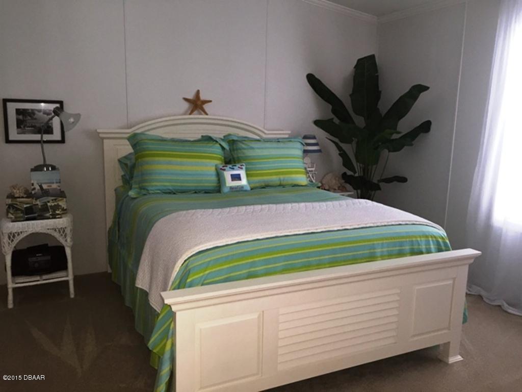 4357 Dolphin Way Edgewater, FL 32141 - Photo 20 of 25 Second Bedroom